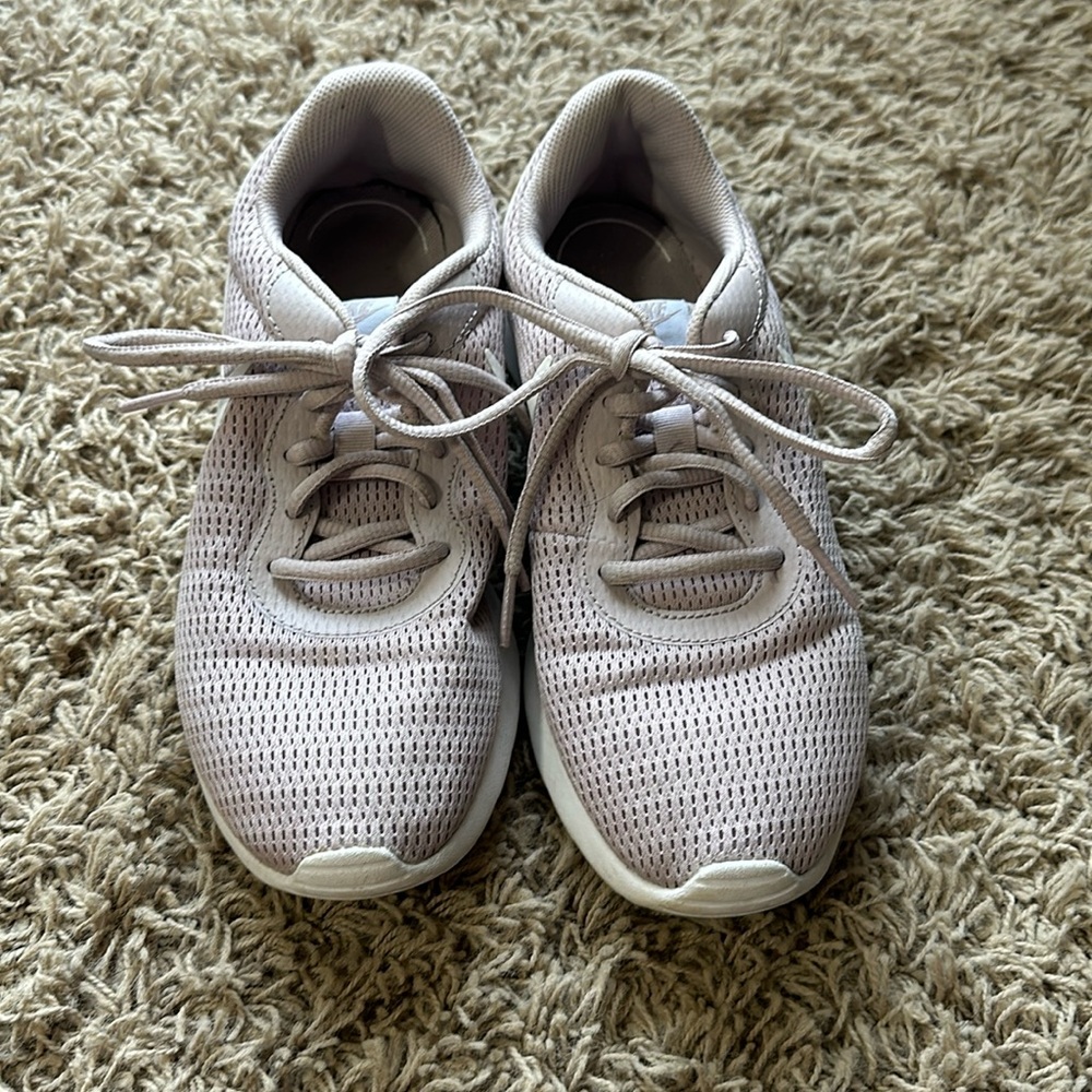 Light pink Nike tennis shoes